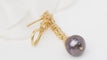 Boucles d'oreilles Boucles d’oreilles pendantes en or jaune 18 ct, diamants et perles de Tahiti 58 Facettes 32802