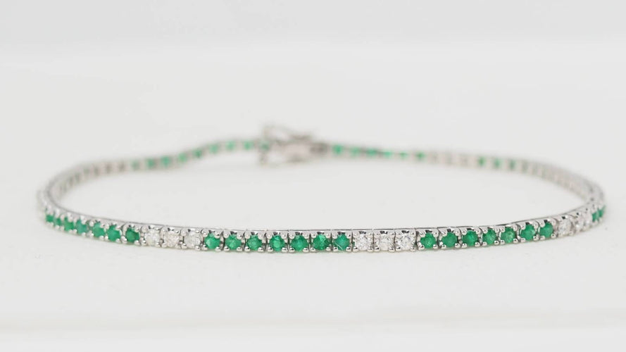 Bracelet 18cm Bracelet rivière en or blanc 18 kt, émeraudes et diamants 58 Facettes 32238