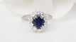 Bague 54 Bague marguerite en or blanc 18 ct, saphir ovale et diamants 58 Facettes 32893