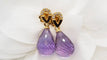 Boucles d'oreilles Boucles d’oreilles pendantes en or jaune 18 ct, améthystes et diamants 58 Facettes 30346