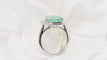 Bague 52 Bague double entourage en or blanc 18 kt, émeraude et diamants 58 Facettes 32636
