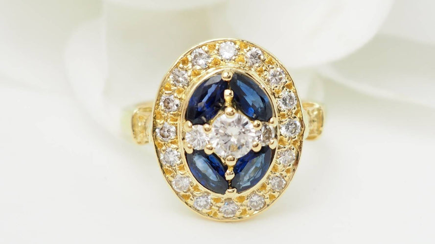 Bague 56 Bague ovale en or jaune 18 ct, saphirs navette et diamants 58 Facettes 32709