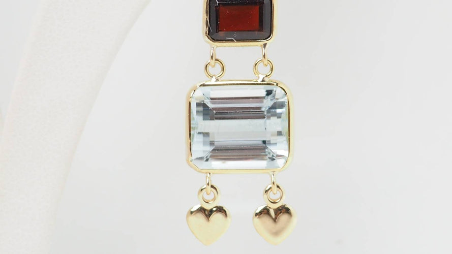 Boucles d'oreilles Boucles d'oreilles en or jaune 18 ct, aigue-marine et grenats 58 Facettes 31504