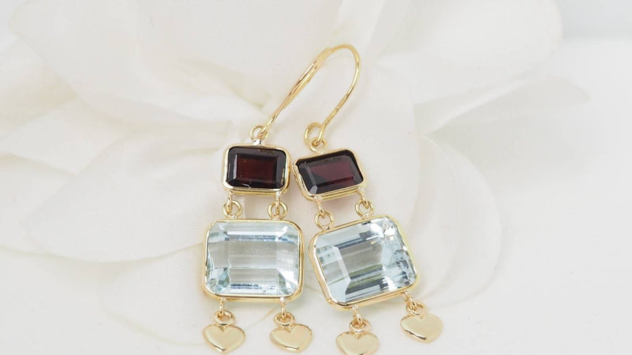 Boucles d'oreilles Boucles d'oreilles en or jaune 18 ct, aigue-marine et grenats 58 Facettes 31504