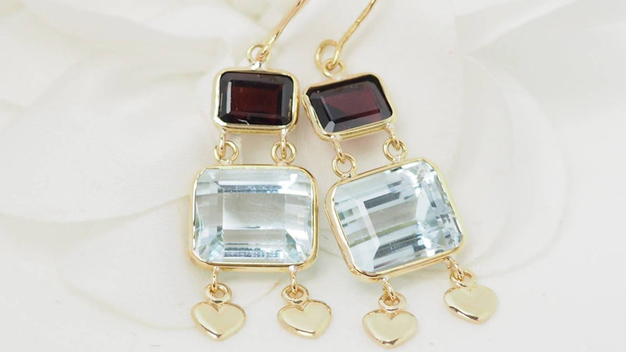 Boucles d'oreilles Boucles d'oreilles en or jaune 18 ct, aigue-marine et grenats 58 Facettes 31504