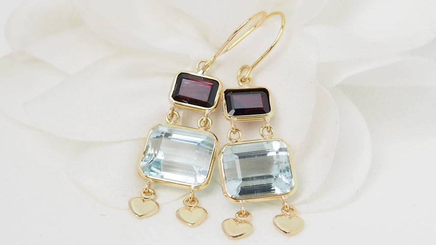 Boucles d'oreilles Boucles d'oreilles en or jaune 18 ct, aigue-marine et grenats 58 Facettes 31504