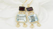 Boucles d'oreilles Boucles d'oreilles en or jaune 18 ct, aigue-marine et grenats 58 Facettes 31504