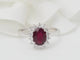 Bague 54 Bague entourage en or blanc 18 ct, rubis 0,95 ct et diamants 58 Facettes 33179