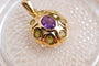 Pendentif Pendentif oval en or jaune 18 carats, améthyste et péridots 58 Facettes Ref2613