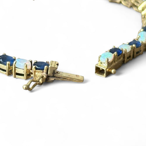 Bracelet Bracelet en or 18 carats serti de saphirs et opales 58 Facettes 344