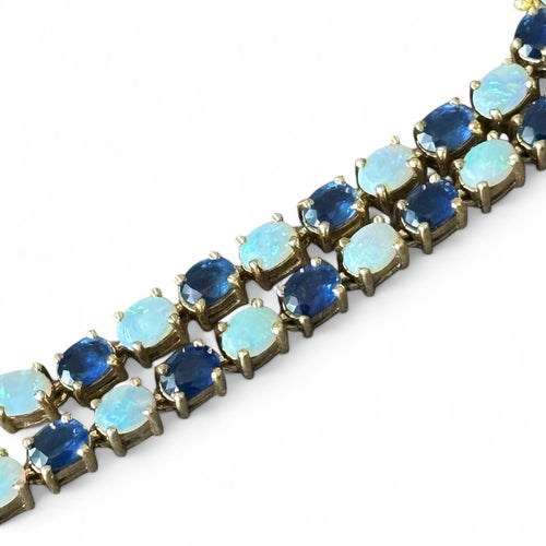 Bracelet Bracelet en or 18 carats serti de saphirs et opales 58 Facettes 344