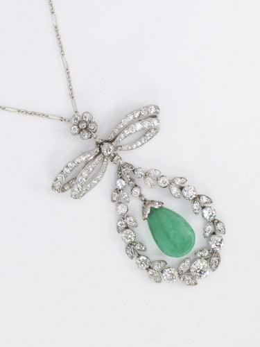 Collier Collier nœud Belle Époque en platine, émeraude et diamants 58 Facettes 1188.1