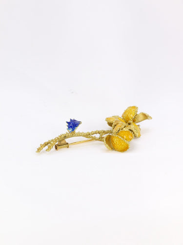 Broche Broche fleur vintage années 1970 en or jaune 18 carats et émail 58 Facettes 998