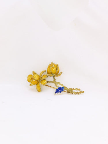 Broche Broche fleur vintage années 1970 en or jaune 18 carats et émail 58 Facettes 998