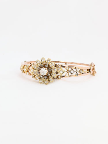 Bracelet Bracelet Napoléon III fleur mobile en or rose et diamants 58 Facettes 1085.3