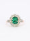Bague 53 Bague marguerite ancienne en or rose et blanc 18 carats, émeraude et diamants 58 Facettes 1108.11