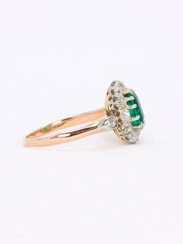 Bague 53 Bague marguerite ancienne en or rose et blanc 18 carats, émeraude et diamants 58 Facettes 1108.11