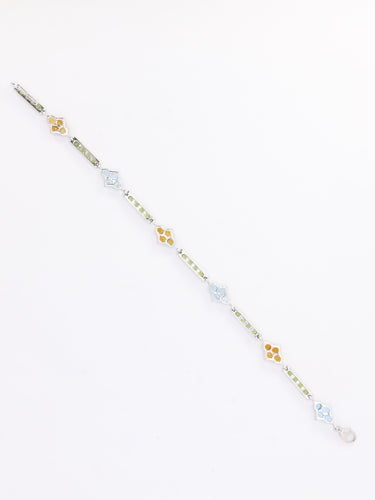 Bracelet Bracelet ligne en or blanc 18 carats avec citrines, péridots et topazes bleues 58 Facettes 1CA0000006/1