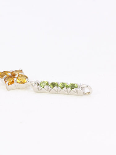 Bracelet Bracelet ligne en or blanc 18 carats avec citrines, péridots et topazes bleues 58 Facettes 1CA0000006/1