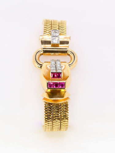 Montre UTI - Montre secrète tubogas en or jaune 18 carats, diamants et rubis calibrés 58 Facettes 1153.5
