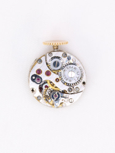 Montre UTI - Montre secrète tubogas en or jaune 18 carats, diamants et rubis calibrés 58 Facettes 1153.5