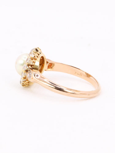 Bague 53 Bague marguerite ancienne en or rose 18 carats, perle et diamants 58 Facettes 1174.5