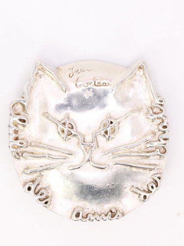 Broche JEAN COCTEAU Broche "Club des Amis des Chats" métal argenté 58 Facettes 1CA0000048/1
