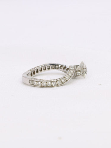 Bague 48 Bague solitaire en or blanc 18 carats et diamants 0,90 ct 58 Facettes 1084.2