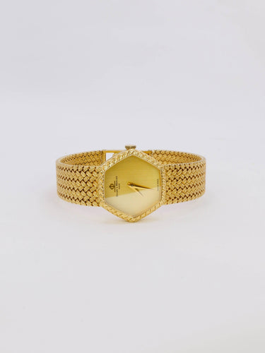 Montre Baume & Mercier - Montre vintage en or jaune 18 carats à maille tressée 58 Facettes 1067.3