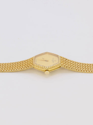 Montre Baume & Mercier - Montre vintage en or jaune 18 carats à maille tressée 58 Facettes 1067.3
