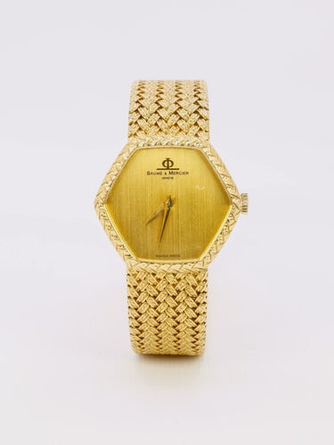 Montre Baume & Mercier - Montre vintage en or jaune 18 carats à maille tressée 58 Facettes 1067.3