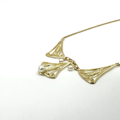 Collier Collier filigrane en or jaune 750 avec perles de culture 58 Facettes Z1351770
