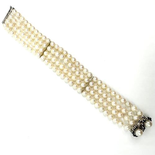 Bracelet Bracelet en or blanc 750 avec perles, saphirs et diamants 58 Facettes Z15B51498