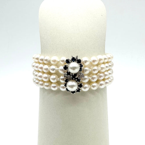 Bracelet Bracelet en or blanc 750 avec perles, saphirs et diamants 58 Facettes Z15B51498