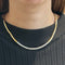 Collier Collier rigide articulé bicolore en or jaune et blanc 750 et diamants 58 Facettes Z15B51552