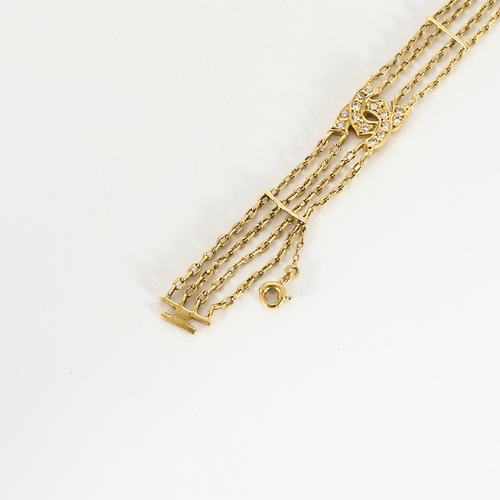 Bracelet CARTIER - Double C vintage en or jaune et diamants 58 Facettes DDV19270-1