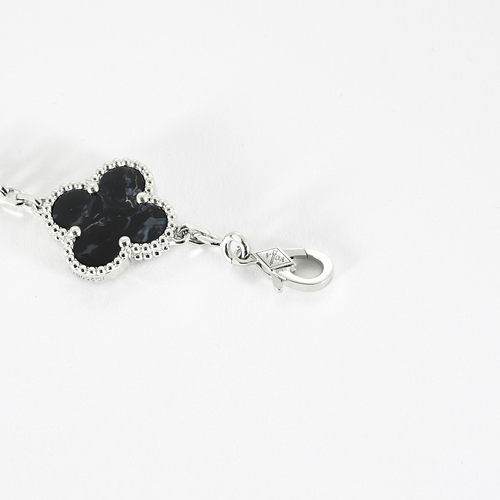 Bracelet Van Cleef & Arpels - Vintage Alhambra - Bracelet en or gris et Pietersite 58 Facettes DV0830-27