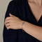 Bracelet Dinh Van Menottes R10 - Bracelet en or gris, Diamants 58 Facettes DV21154-1