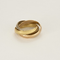 CARTIER- MUST - Trinity - Bague trois anneaux en or de trois couleurs.