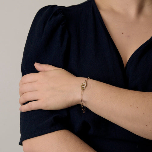 Bracelet Dinh Van Menottes R10 Bracelet en or jaune et diamants 58 Facettes DV21602-14