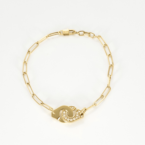 Bracelet Dinh Van Menottes R10 Bracelet en or jaune et diamants 58 Facettes DV21602-14