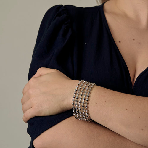 Bracelet Bracelet ruban en or gris et diamants 58 Facettes DV22966-1
