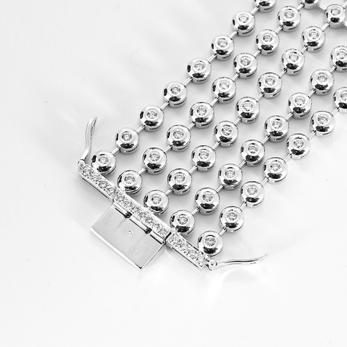 Bracelet Bracelet ruban en or gris et diamants 58 Facettes DV22966-1