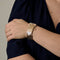 Bracelet Elegant Bracelet ruban or jaune, diamants et rubis 58 Facettes DV22972-13