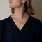 Collier Dinh Van Collier Menottes R10 en or blanc et  diamants 58 Facettes DV21602-10