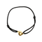 Bracelet DINH VAN - Serrure - Bracelet Menotte R8 en or jaune. Cordon noir. 58 Facettes DDV21270-1