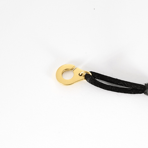 Bracelet DINH VAN - Serrure - Bracelet Menotte R8 en or jaune. Cordon noir. 58 Facettes DDV21270-1