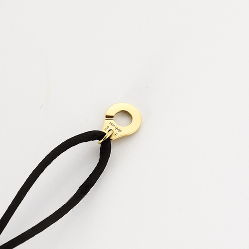 Bracelet DINH VAN - Serrure - Bracelet Menotte R8 en or jaune. Cordon noir. 58 Facettes DDV21270-1