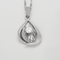 Chaîne en or blanc retenant un pendentif serti d'un diamant 58 Facettes DV25961-7