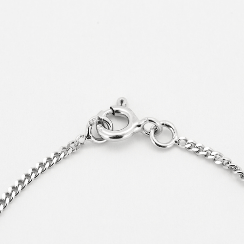Chaîne en or blanc retenant un pendentif serti d'un diamant 58 Facettes DV25961-7